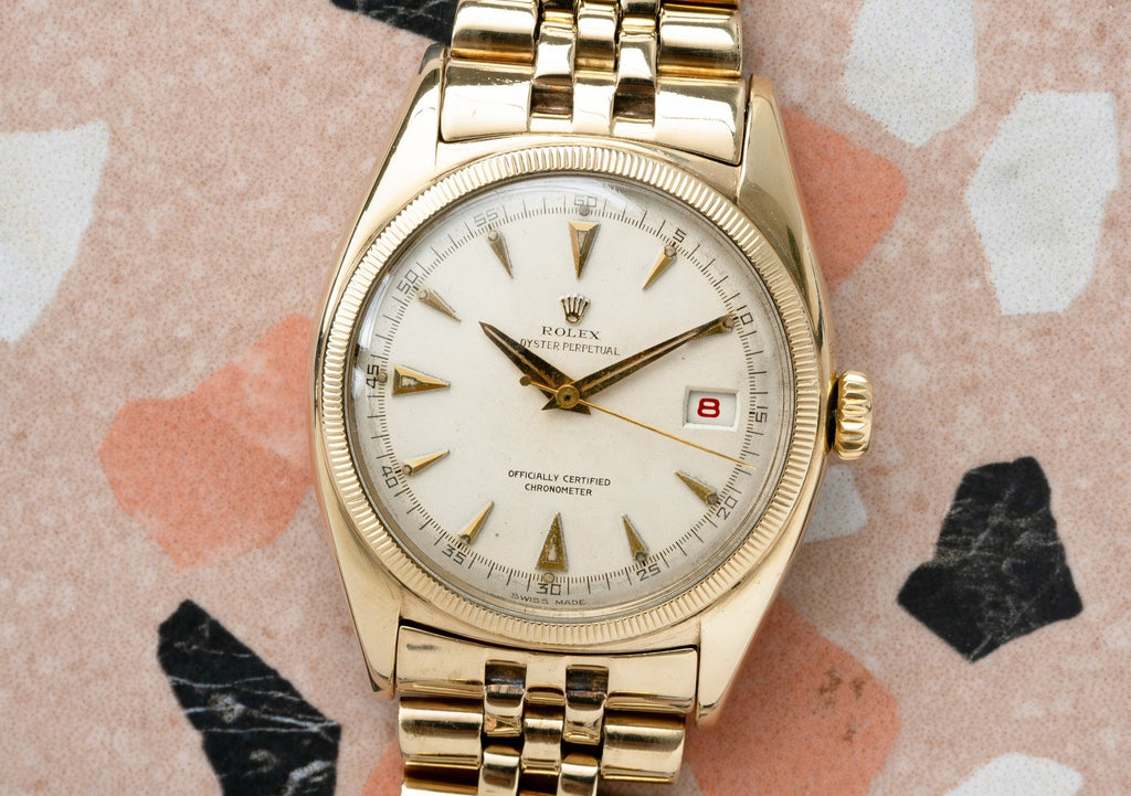 ROLEX Oyster Perpetual Datejust Ovettone Bubbleback Ref. 6075 10ct Gold (1951)