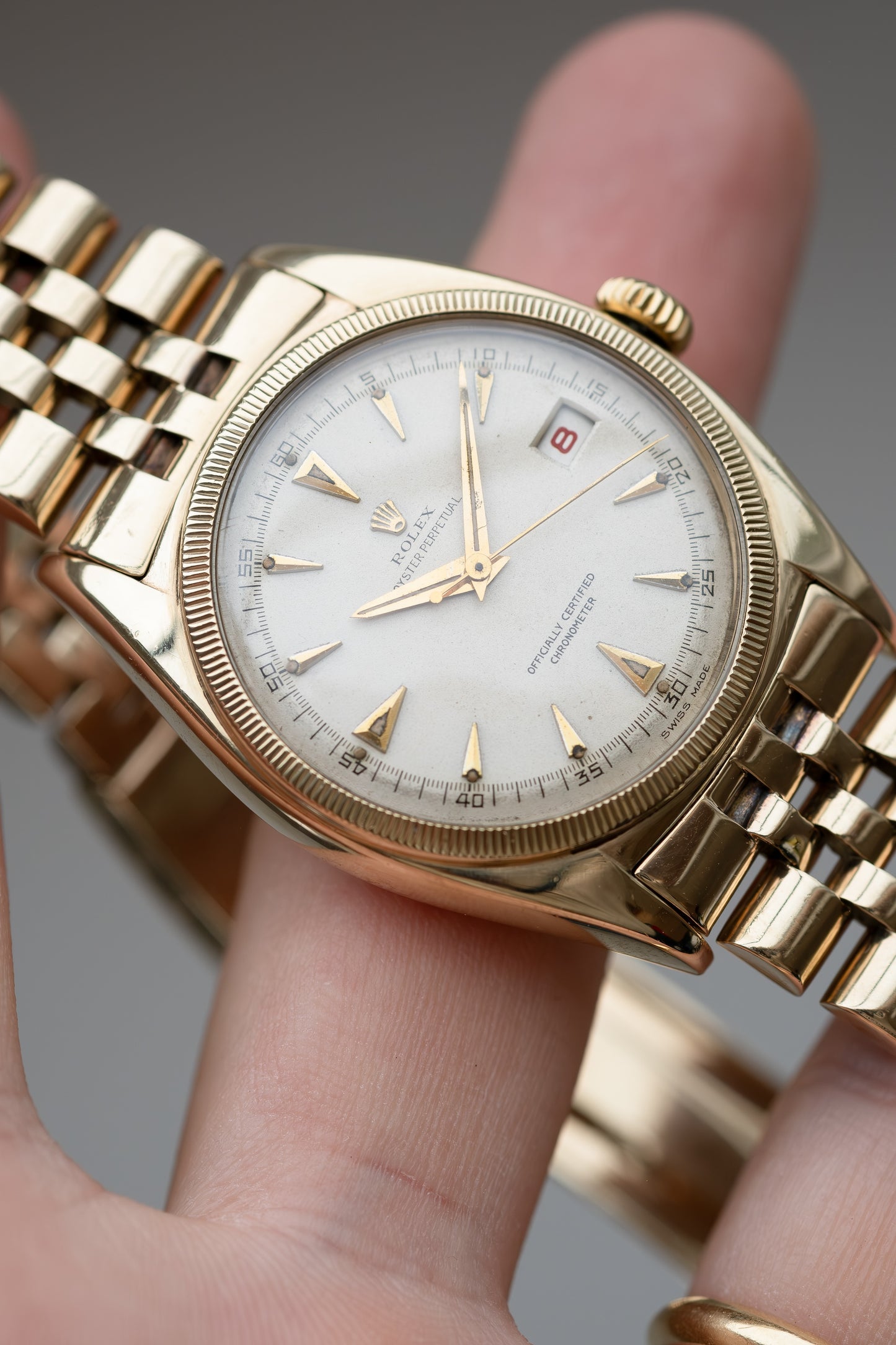 ROLEX Oyster Perpetual Datejust Ovettone Bubbleback Ref. 6075 10ct Gold (1951)