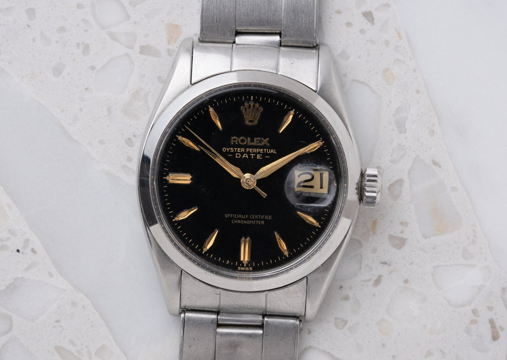 ROLEX Oyster Perpetual Date Gilt Dial Ref. 6534 Boxes and Service Papers (1957)